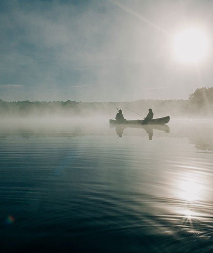 Two man on canoe