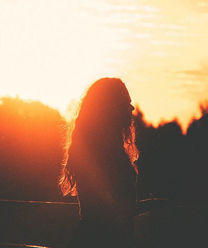 Girl in sunset