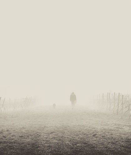 Man walking in fog