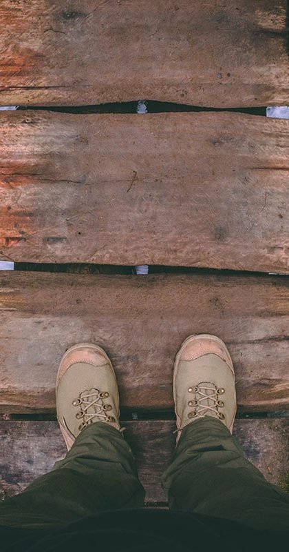 Man standing on a bridge